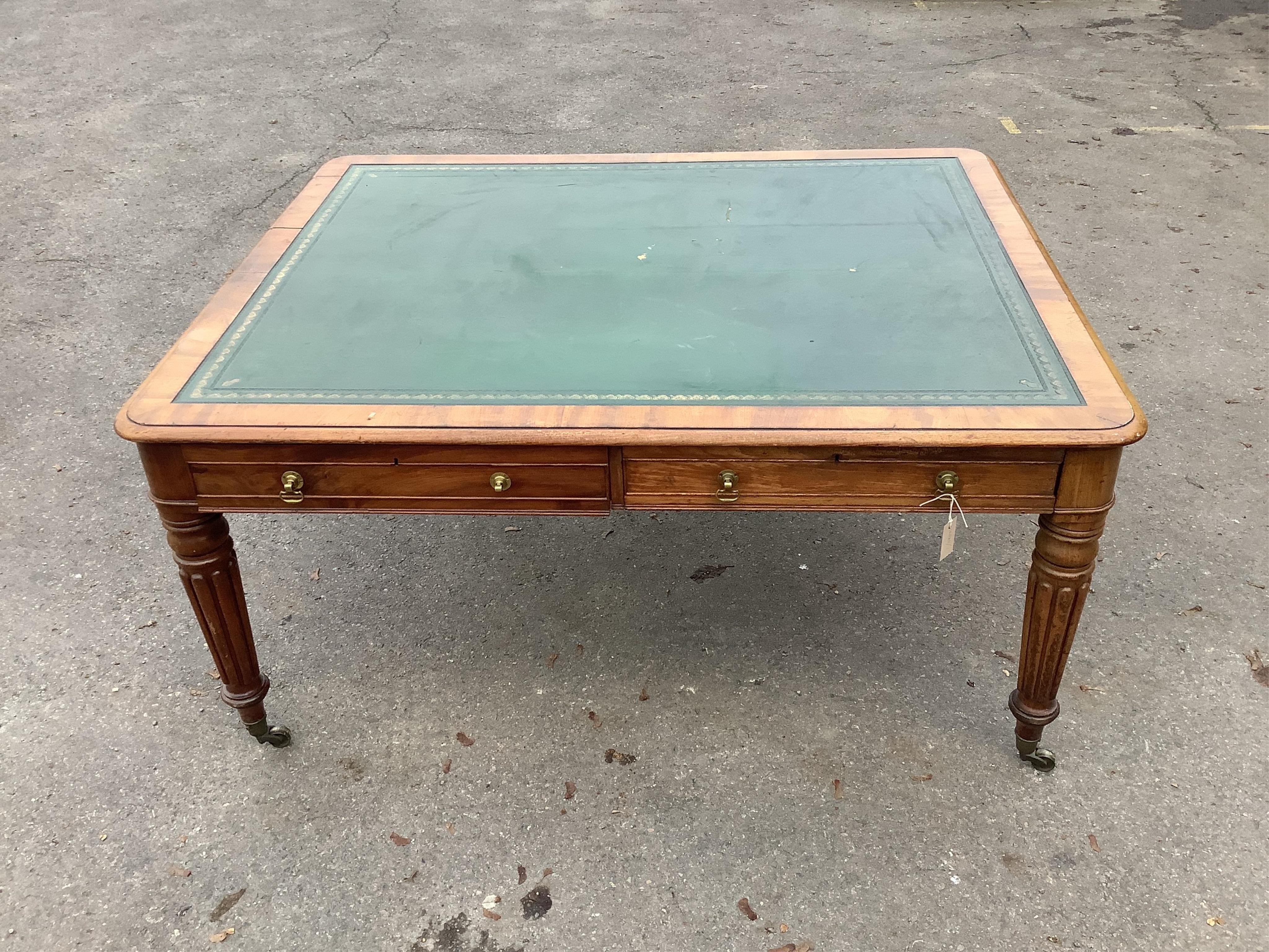 An early Victorian mahogany library table fitted four drawers, width 160cm, depth 130cm, height 78cm. Condition - fair